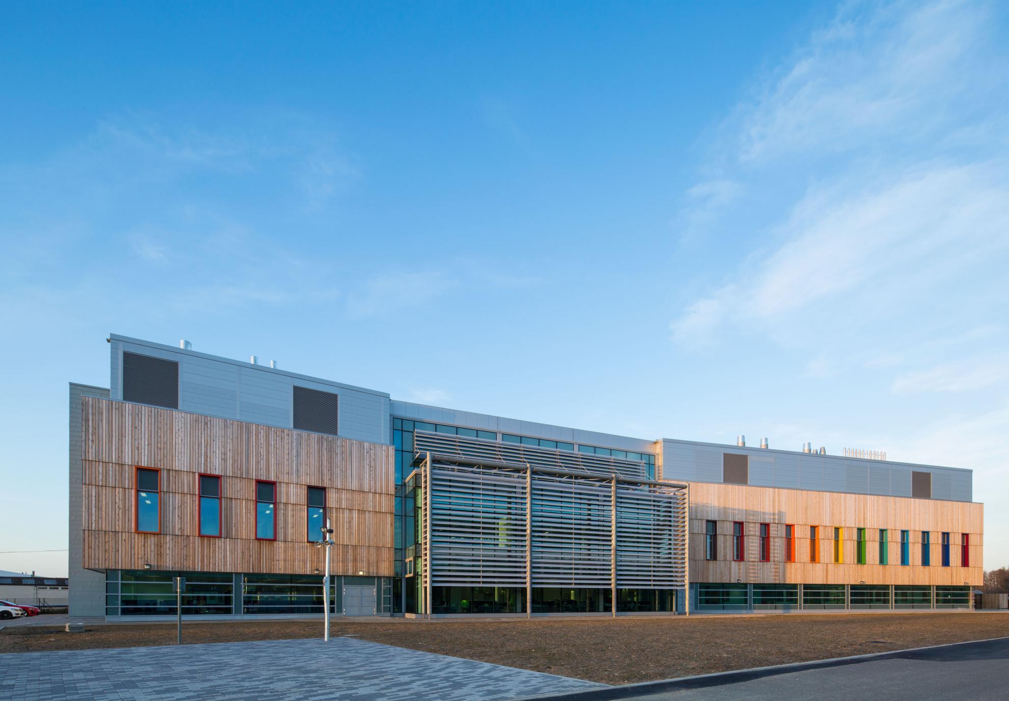 Exterior of The Pirbright Institute, day time, blue skies
